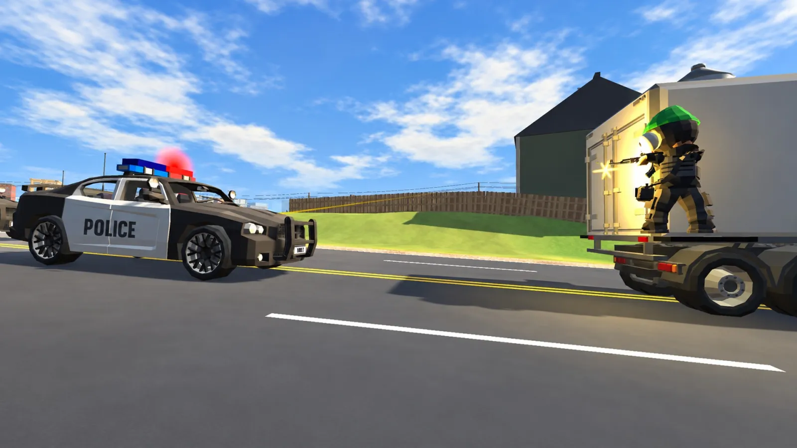 A robber stands on the back of a box truck as a police car pulls up.